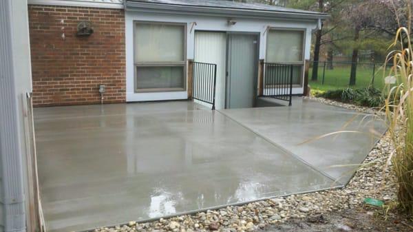 Removed existing wood deck and poured a new concrete patio