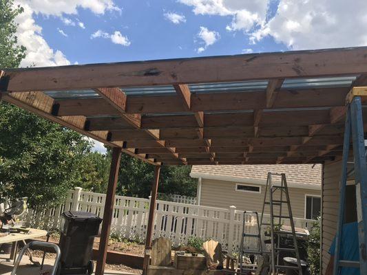 Built pergola with roof from scratch