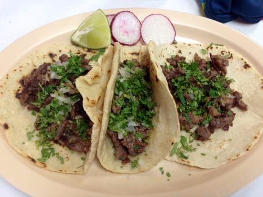 Carne Asada tacos on homemade tortillas $6.75 for 3