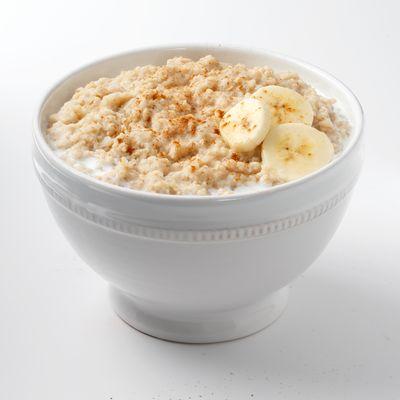 Who doesn't like to keep warm with a delicious bowl of oatmeal like this one with milk, bananas, and cinnamon!