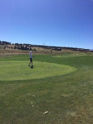 Son driving off hole 4 tee. Corse in great shape.