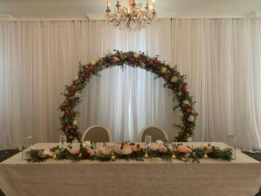 Flower arch with drape