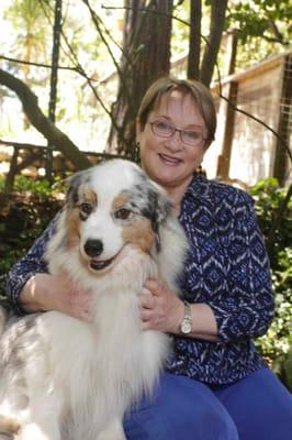 When appropriate, Dr. Bloomberg works with her therapy dog, Elle.