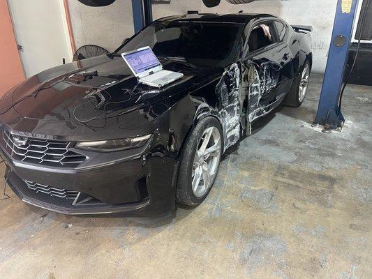 BEFORE FULL BODY STRUCTURAL REPAIRS ON THIS 2021 CHEVROLET CAMARO.