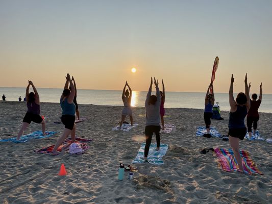 Sunrise yoga on the beach