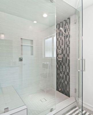 Full bathroom remodeling, tile flooring & tile walls .
Small shelf by customer request.