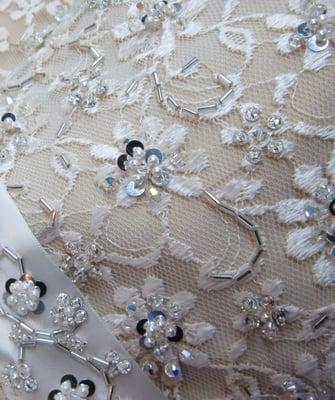 Closeup detail of the Hand Beaded bodice on a VanLear Custom Made Bridal Gown.