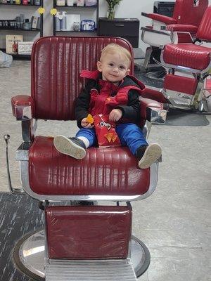 Waiting patiently for a haircut.