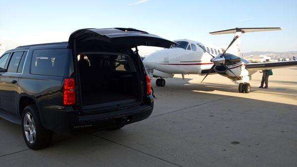 Superior Ride meets Optimum Air Ambulance King Air 200 at the Luxivaire Terminal, San Bernardino International Airport. By: Larry Erickson