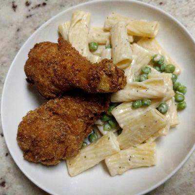 Cornbread fried chicken with white wine cream sauce pasta with peas