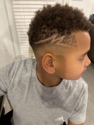 11 year old fade with design.