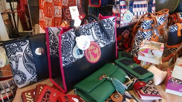 A variety of handbags, shoulder bags and wallets.