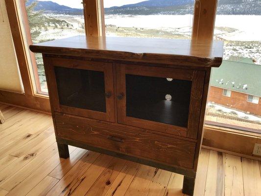 TV/Entertainment center with steel base.