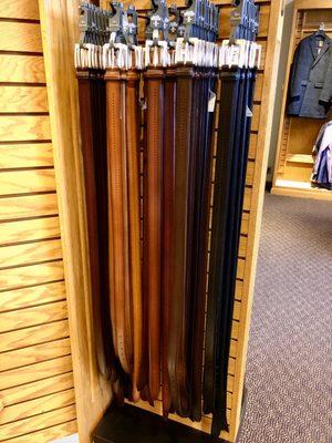 One of many racks of belts around the store