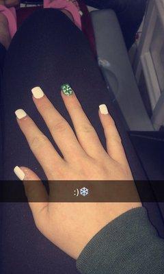 These nails were very festive for the holiday season. The snowflake was painted on by John and it was perfect!