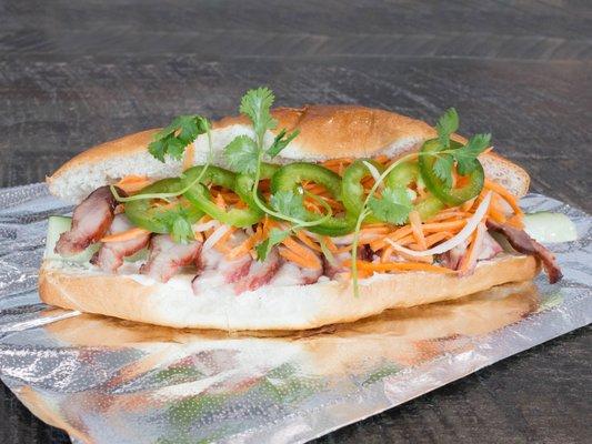 Loaded roast pork Bahn Mi sandwich