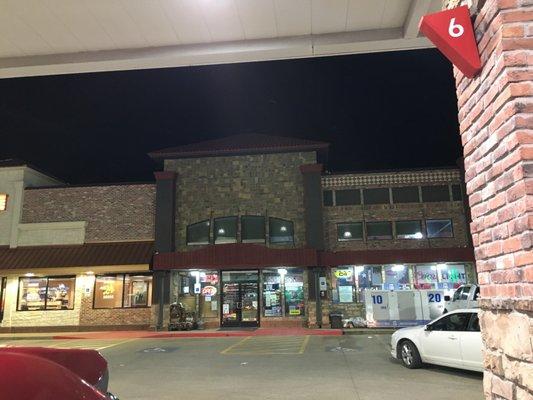 Store front of the convenience store at night