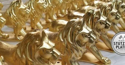 Gold plated lion sculptures