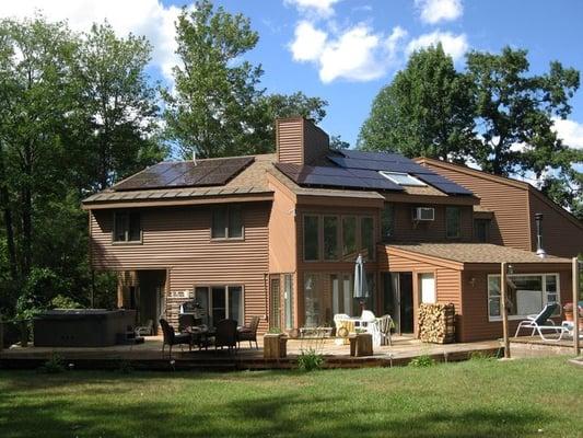 One of our residential solar photovoltaic (electricity-producing) systems in Windham, NH.