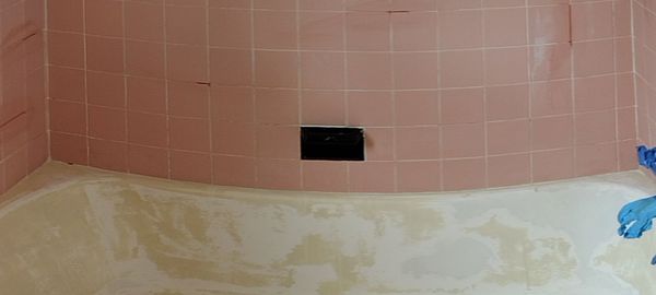 Before old pink tile and out dated bathroom