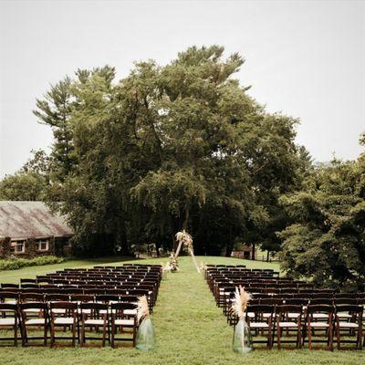 chairs set up for outdoor wedding ceremony