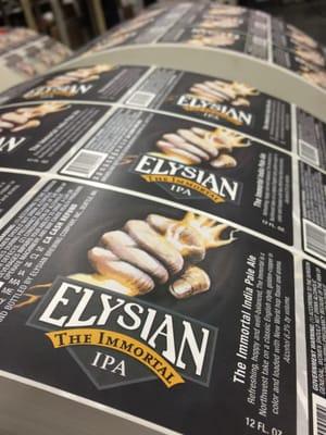 Flexographic label rolls for Elysian Brewing Company's The Immortal India Pale Ale on December 5, 2014