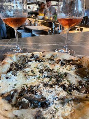 Mushroom pizza and two glasses of rosé  excellent