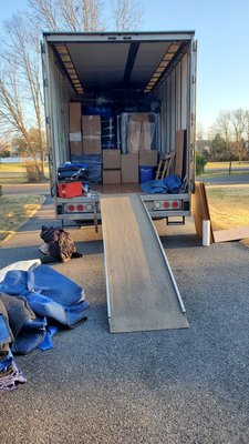 It took a team of 4 men to load this truck to the capacity and unload it. Very efficient.