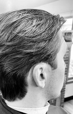 Textures medium length men's haircut. Perfect for business or messy casual.