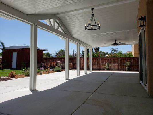 Solid Alumawood patio cover with a gabled roof line.