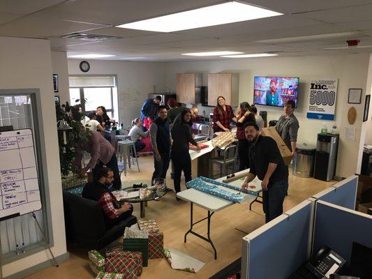 Wrapping gifts for the DCF Wonderfund