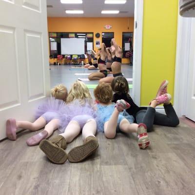 Some of our tiny dancers watching our big girls.