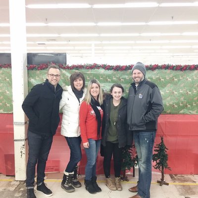 Our team volunteered at the Johnson County Christmas Bureau. We had a great time & can't wait to help out again next year!  Happy Holidays!