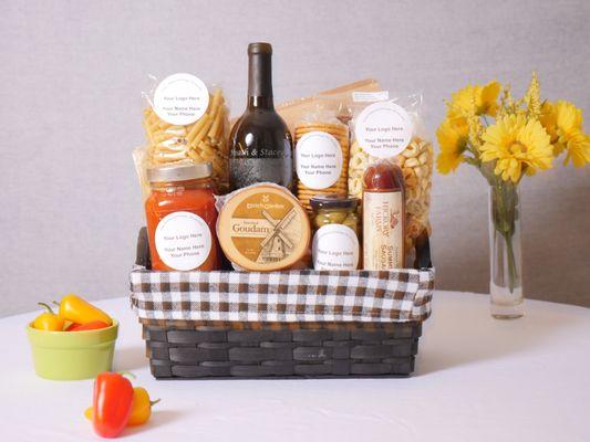 Italian Basket - 2 pastas, spaghetti sauce,  cheese, peppers, sausage, crackers, olives, cake pops, covered pretzels, bamboo cutting board