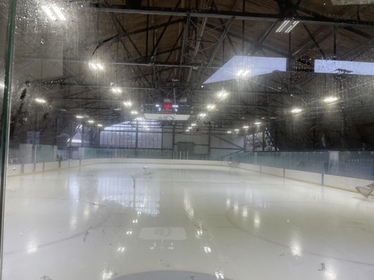 The Zamboni driver tried to clear a little spot through which to see.