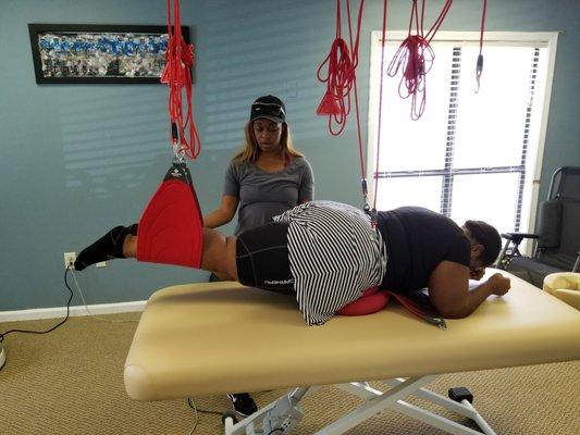 Our awesome patient on our Red Cord Suspension system