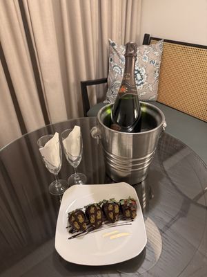 Welcome champagne and chocolate covered strawberries