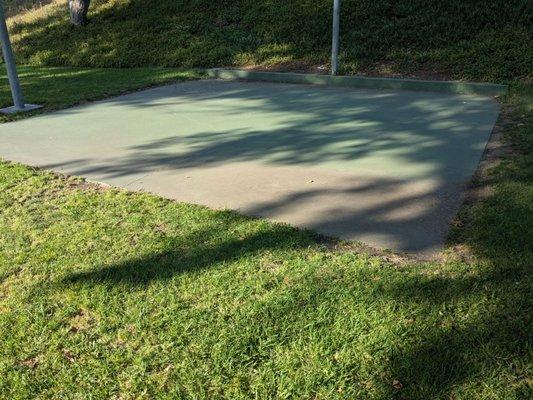 Basketball court doesn't have any lines, so you can't tell where the free throw line is