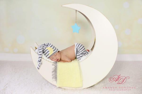 Sleepy baby in a moon...