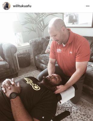 Treating NFL star Will Tukuafu in his beautiful home.