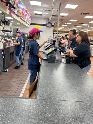 The silly cashier who decided to skip a paying customer to wait on a coworker