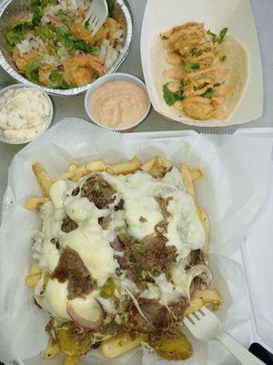 Philly cheese fries, shrimp tacos, and fried shrimp