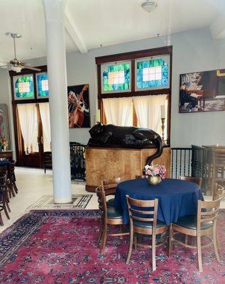 Peek through the window into the lobby. Surprise, another panther sculpture!