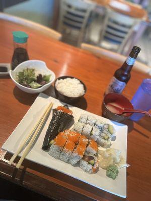 Sushi combo with a side of rice and "small" Asahi.