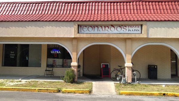 back entrance (I'd consider this the carry-out entrance) on the south side of the restaurant, basically facing Publix and Book Gallery West