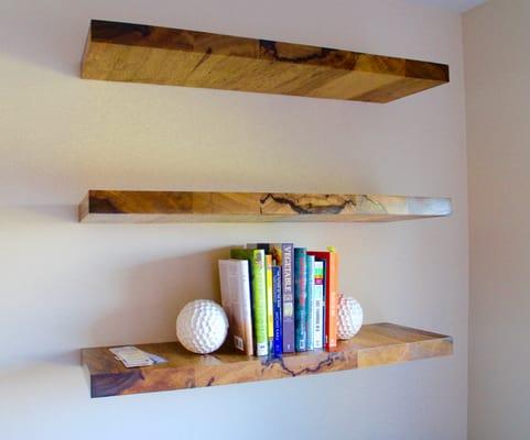 Black limba exotic wood floating shelves Brent made for a home in Carlsbad.