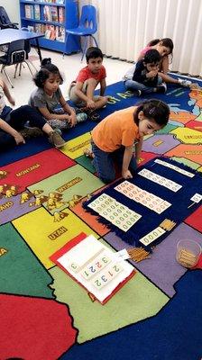 Learning time! (Children are learning with all Montessori materials in conjunction with some preschool basics).