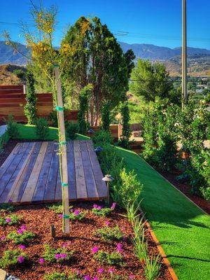 deck on hill in backyard