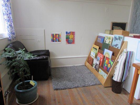 The reading nook in a Schoolhouse classroom. Cozy!