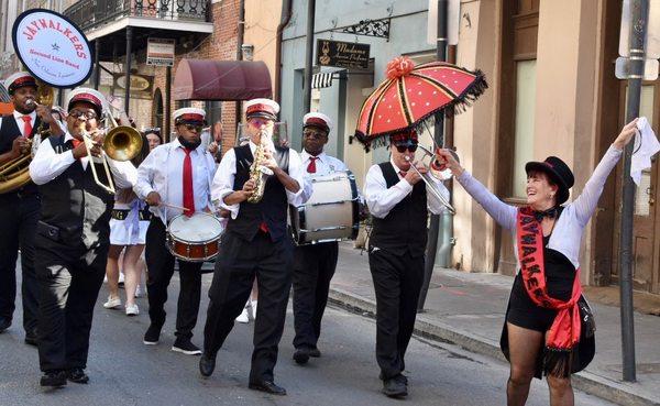 2nd Line parading in front of Madame Aucoin Perfume